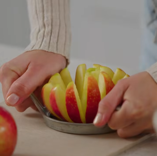 consumer cutting apples